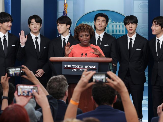 WASHINGTON, DC - MAY 31: White House Press Secretary Karine Jean-Pierre welcomes V, Jungkook, Jimin, RM, Jin and J-Hope of the South Korean pop group BTS to the daily press briefing at the White House on May 31, 2022 in Washington, DC. BTS met with U.S. President Joe Biden to …