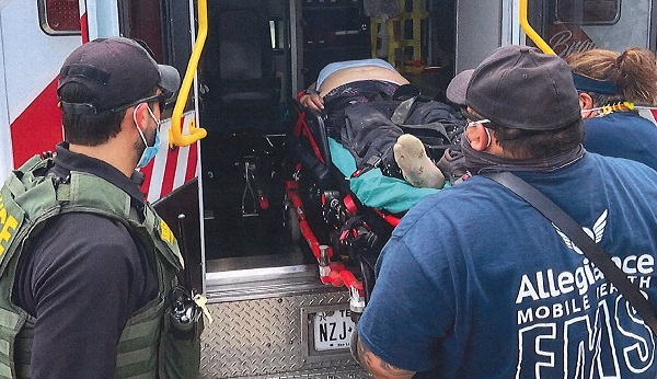 EMS workers attempt to save the life of a Mexican woman found unconscious on a ranch south of the Border Patrol Checkpoint. (Brooks County Sheriff's Office)