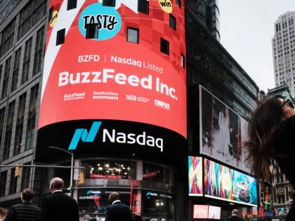 NEW YORK, NEW YORK - DECEMBER 06: BuzzFeed is displayed in front of the Nasdaq market site as the media company goes public on the Nasdaq through a merger with a special-purpose acquisition company on December 06, 2021 in New York City. Shares of the digital media company, trading under …
