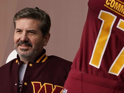 Dan Snyder, co-owner and co-CEO of the Washington Commanders, poses for photos during an event to unveil the NFL football team's new identity, Wednesday, Feb. 2, 2022, in Landover, Md. A person with knowledge of the situation tells The Associated Press the Washington Commanders have bought land in Virginia for …