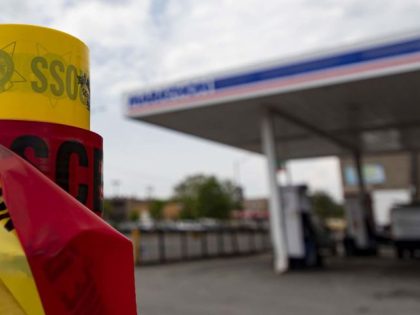 Crime scene tape is left at a gas station in the 800 block of North Cicero Avenue on Thursday, May 19, 2022, where Chicago police shot a 13-year-old carjacking suspect Wednesday. (Brian Cassella/Chicago Tribune/Tribune News Service via Getty Images)