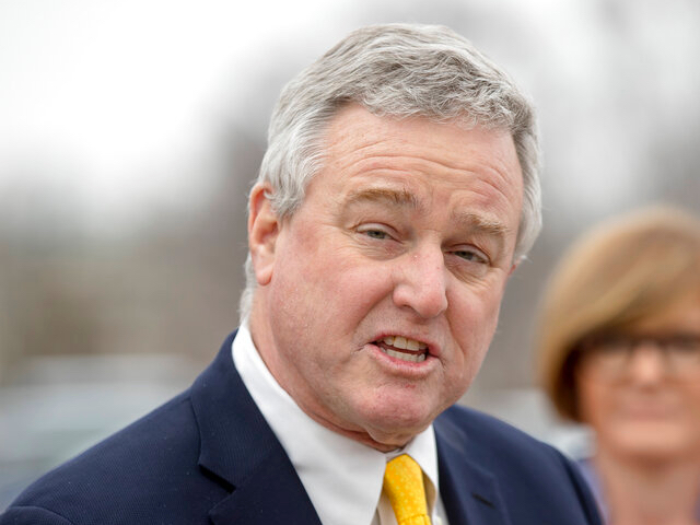Rep. David Trone, D-Md., accompanied by Rep. Susie Lee, D-Nev., speaks at a news conference on Capitol Hill in Washington, Thursday, Jan. 17, 2019, to unveil the "Immediate Financial Relief for Federal Employees Act" bill which would give zero interest loans for up to $6,000 to employees impacted by the government shutdown and any future shutdowns. (AP Photo/Andrew Harnik)