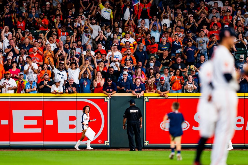 Astros fan Oliver, 6, runs toward the "finish line" during a Steal Second Base promotion as the crowd cheers him on Tuesday night during the Astros-Mets game at Minute Maid Park in Houston, Texas.