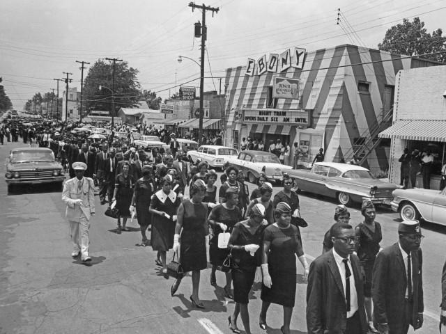 The funeral procession of American civil rights activist Medgar Evers, who was shot dead outside his home in a racially-motivated assassination, in Jackson, Mississippi, June 18, 1963. (Express/Archive Photos/Hulton Archive/Getty Images)