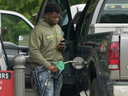 A customer prepares to pump diesel fuel at this Madison, Miss., Sam's Club, Tuesday, May 2