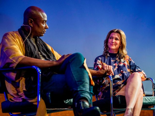 Norwegian princess Maertha poses on stage with shaman Durek Verrett (L) during a session a