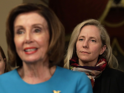 U.S. Speaker of the House Rep. Nancy Pelosi (D-CA) speaks to members of the media as ep. Lizzie Fletcher (D-TX), and Rep. Abigail Spanberger (D-VA) listen at the U.S. Capitol March 13, 2020 in Washington, DC. Speaker Pelosi held a briefing on the Coronavirus Aid Package Bill that will deal …
