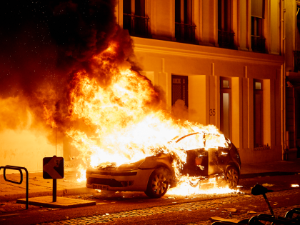 Car bruns on August 23, 2020 at the Champs-Elysees avenue, Paris, France during the Clashes between police and PSG fans broke out after the end of the game. PSG lost 1-0 against Bayern Munich. (Photo by Adnan Farzat/NurPhoto via Getty Images)