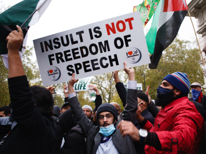 Demonstrators opposing the publication in France of cartoons of the Prophet Mohammad protest outside the French Embassy in London, England, on October 30, 2020. French President Emmanuel Macron has deployed thousands of soldiers to sites including places of worship and schools across France at a time of rising Muslim anger …
