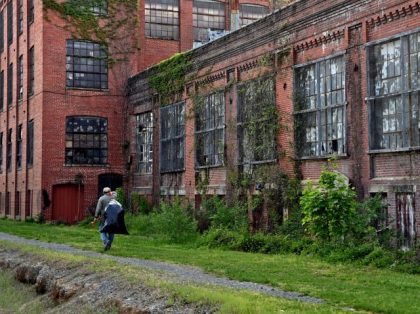 MARTINSBURG, WV- APRIL 28: There are several abandoned warehouses and former factories as seen in Martinsburg, West Virginia on April 28, 2021. Often locals enter the buildings and use parts of them as a drug use den. Because of the pandemic, scores of people taking part in opioid recovery programs …