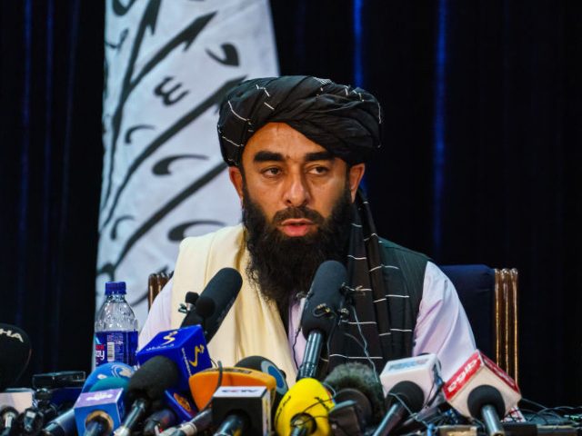 KABUL, AFGHANISTAN -- AUGUST 17, 2021: Zabihullah Mujahid, the Taliban spokesman for nearly 2 decades who worked in the shadows, makes his first-ever public appearance to address concerns about the Taliban' reputation with women's education, appearance and rights, television music and executions, during a press conference in Kabul, Afghanistan, Tuesday, …