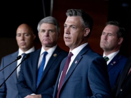 Representative Jim Banks, a Republican from Indiana, center, speaks during a news conferen