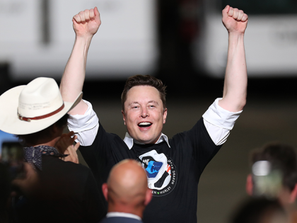 Spacex founder Elon Musk celebrates after the successful launch of the SpaceX Falcon 9 roc
