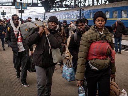 LVIV, UKRAINE - MARCH 9: African people studying in Sumy arriving at the main train station in Lviv, Ukraine on March 9, 2022. Students with Indian, Chinese and different African nationalities have arrived today in Lviv from Sumy, a city located in eastern Ukraine, through a humanitarian corridor created to …