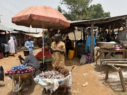Street vendors are seen as people do shopping at a market area within preparations for the upcoming holy Islamic fasting month of Ramadan in Abuja, Nigeria on March 26, 2022. (Photo by Adam Abu-bashal/Anadolu Agency via Getty Images)
