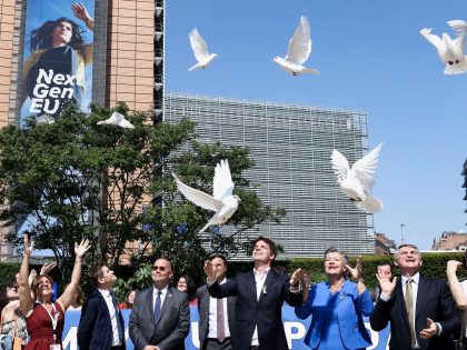 EU commissioner for Home Affairs Ylva Johansson releases white doves during a Europe Day Ceremony in support of Ukraine hosted by the Representation of the European Commission on May 09, 2022 in Brussels in front of Berlaymont Building, headquarters of the European Commission. (Photo by Kenzo TRIBOUILLARD / AFP) (Photo …
