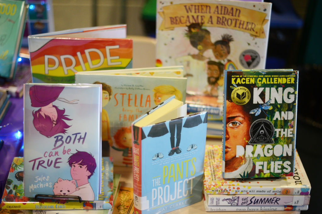 BETHESDA, MD - MAY 21: Children books that are fighting for survival at public schools because of their LGBTQ content are displayed at the annual Pride Town Hall at Walter Johnson High School in Bethesda, MD, May 21, 2022, with students and their families, staff, youth service providers and community members attending.The event featured workshops and a resource fair and keynote speaker Gavin Grimm, a nationally known advocate for transgender rights. (Photo by Astrid Riecken for The Washington Post via Getty Images)