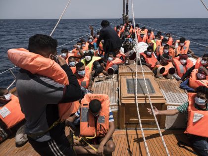 AT SEA, UNSPECIFIED - MAY 24: Rescue operation underway for migrants in Malta SAR Zone, on May 24, 2022. In the fifth operation of the 91st rescue mission of Astral, the sailboat of the Spanish NGO Open Arms, rescued 110 persons from different nationalities including a woman and a child …