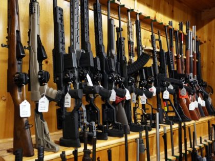 A rifles are on display at That Hunting Store on June 3, 2022 in Ottawa, Canada. - Canadians rushed to buy handguns this week, after Prime Minister Justin Trudeau announced on May 30, 2022, a proposed freeze on sales in the wake of recent mass shootings in the US. "Sales …