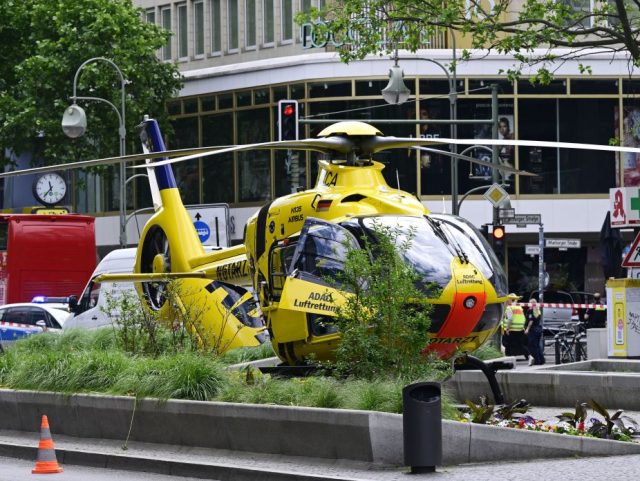 A rescue helicopter lands on Tauentzienstraße at the site where one person was killed and eight injured when a car drove into a group of people in central Berlin, on June 8, 2022. - A police spokeswoman said the driver was detained at the scene after the car ploughed into …