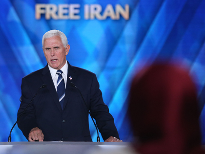 Former Vice President of the United States Mike Pence addresses a speech to the People's Mojahedin Organization of Iran (MEK) inside of the Ashraf-3 camp, in the Albanian town of Manza, on June 23, 2022. (Photo by Gent SHKULLAKU / AFP) (Photo by GENT SHKULLAKU/AFP via Getty Images)