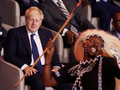 KIGALI, RWANDA - JUNE 24: British Prime Minister Boris Johnson (L) and Rwandan President Paul Kagame look on the opening ceremony of the Commonwealth Heads of Government Meeting at Kigali Convention Centre on June 24, 2022 in Kigali, Rwanda. Leaders of Commonwealth countries meet every two years for the Commonwealth …