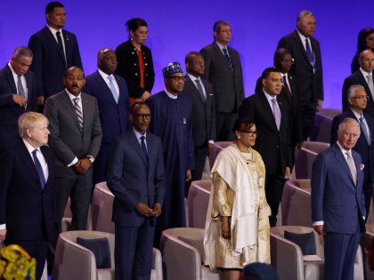 (FRONT L-R) Britain's Prime Minister Boris Johnson, Rwanda's President Paul Kagame, Secretary-General of the Commonwealth of Nations Patricia Scotland and Britain's Prince Charles, Prince of Wales stand with other digintaries during the opening ceremony of the Commonwealth Heads of Government Meeting at Kigali Convention Centre in Kigali, on June 24, …