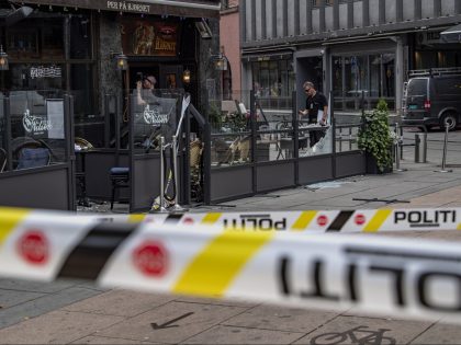 OSLO, NORWAY - JUNE 25: Police examine the restaurant whose windows were shattered by a mass shooting on June 25, 2022 in Oslo, Norway. Two people were killed and at least 10 were injured when a man opened fire early Saturday morning near a popular gay club in the city's …