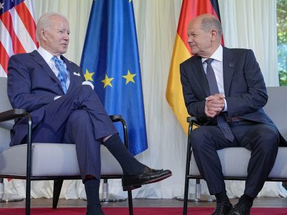 26 June 2022, Bavaria, Elmau: German Chancellor Olaf Scholz (SPD), sits next to U.S. President Joe Biden (l) at the start of a bilateral meeting before the start of the actual summit. Germany is hosting the G7 summit of economically strong democracies at Schloss Elmau from June 26 to 28, …