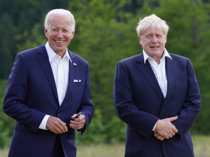 GARMISCH-PARTENKIRCHEN, GERMANY - JUNE 26: U.S. President Joe Biden and British Prime Minister Boris Johnson attend the G7 group photo on the first day of the G7 summit at Schloss Elmau on June 26, 2022 near Garmisch-Partenkirchen, Germany. Leaders of the G7 group of nations are officially coming together under …