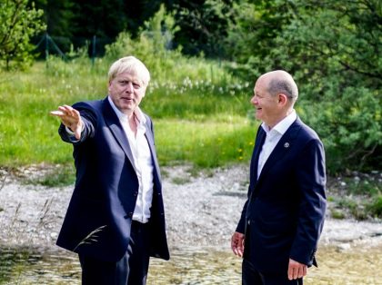 GARMISCH-PARTENKIRCHEN, GERMANY - JUNE 26: German Chancellor Olaf Scholz (R) and UK Prime Minister Boris Johnson (L) ahead of their bilateral meeting at Elmau Castle on June 26, 2022 near Garmisch-Partenkirchen, Germany. Leaders of the G7 group of nations are officially coming together under the motto: "progress towards an equitable …