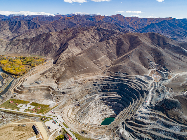 Aerial view of the 'No.3 pegmatite', the largest mining pit in the world which has deposits of 84 kinds of minerals, at the Koktokay National Geopark on September 27, 2020 in Fuyun County, Xinjiang Uygur Autonomous Region of China. (Photo by Shen Longquan/VCG via Getty Images)