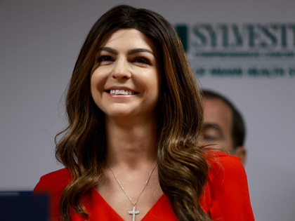 First lady Casey DeSantis, who recently survived breast cancer, listens as her husband Florida Gov. Ron DeSantis speaks during a press conference at the University of Miami Health System Don Soffer Clinical Research Center on May 17, 2022 in Miami, Florida. The governor held the press conference to announce that …
