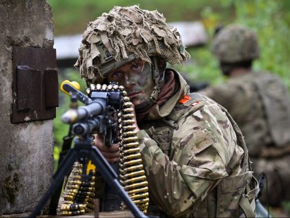 VORU, ESTONIA - MAY 26: Soldiers from Royal Welsh Battlegroup take part in maneuvers during NATO exercise Hedgehog on the Estonian Latvian border on May 26, 2022 in Voru, Estonia. Military personnel from fourteen countries sees fifteen thousand troops take part in one of the largest exercises to take part …
