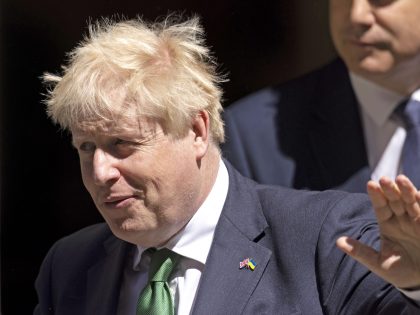 LONDON, ENGLAND - JUNE 08: Prime Minister Boris Johnson departs No 10 Downing Street to attend Prime Minister's Questions in the House of Commons on June 8, 2022 in London, England. It is his first PMQs since he survived Monday's vote of confidence, in which more than a third of …