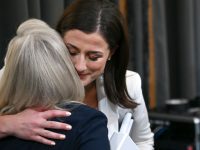 WASHINGTON, DC - JUNE 28: Cassidy Hutchinson, a top former aide to Trump White House Chief of Staff Mark Meadows, hugs U.S. Rep. Liz Cheney (R-WY) after testifying during the sixth hearing by the House Select Committee to Investigate the January 6th Attack on the U.S. Capitol in the Cannon House Office Building on June 28, 2022 in Washington, DC. The bipartisan committee, which has been gathering evidence for almost a year related to the January 6 attack at the U.S. Capitol, is presenting its findings in a series of televised hearings. On January 6, 2021, supporters of former President Donald Trump attacked the U.S. Capitol Building during an attempt to disrupt a congressional vote to confirm the electoral college win for President Joe Biden. (Photo by Brandon Bell/Getty Images)