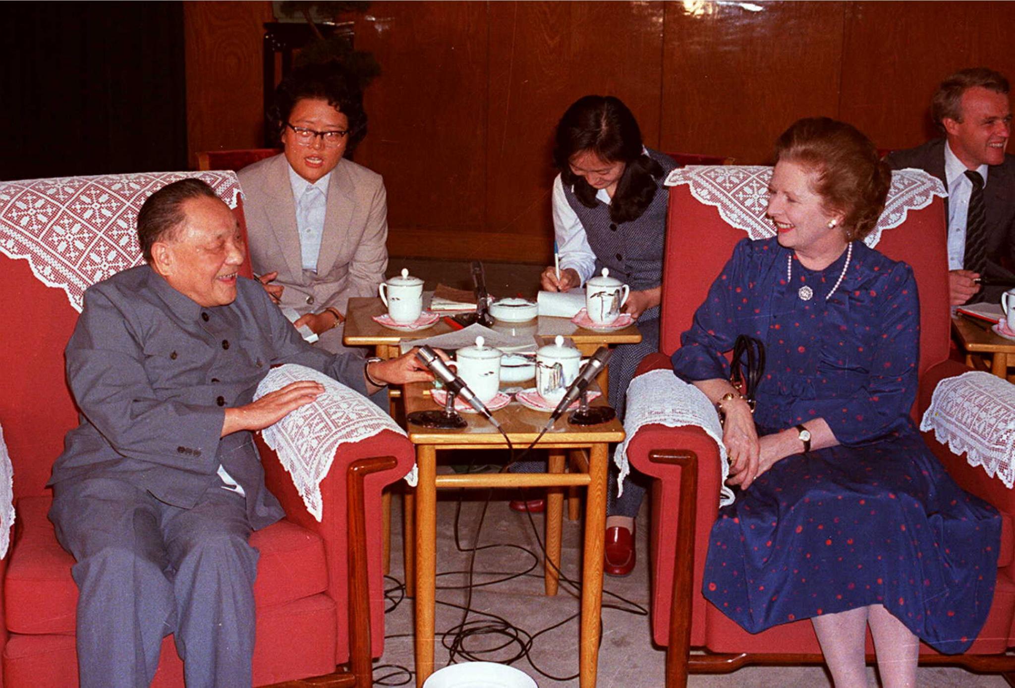 Chairman of the Chinese Communist Party Central Advisory Committee, Deng Xiaoping (L) and British Prime Minister Margaret Thatcher (R) talk in a file photo dated 24 September 1982 at the Great Hall of the People in Beijing during one of their meetings leading up to the signing of the Sino-British Joint Declaration on the future of Hong Kong on 26 September in 1984, setting up the territory as a Special Administrative Region of China. . CHINA OUT / AFP / XINHUA / STR (Photo credit should read STR/AFP via Getty Images)