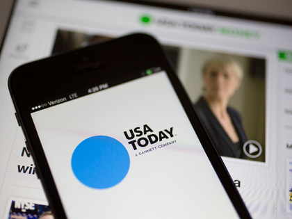 The Gannett Co. USA Today newspaper application is displayed on an Apple Inc. iPhone 5s an