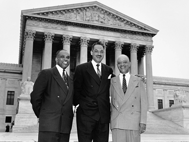 Attorneys who argued the case against segregation stand together smiling in front of the U.S. Supreme Court Building after the High Tribunal ruled that segregtion in public schoolsis unconstitutional. Left to right are: George E.C. Hayes, Washington, DC; Thurgood Marshall, special counsel for the NAACP; and James Nabrit, Jr., Progessor …