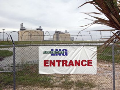 Signage hangs on a fence near to the entrance of the Freepor UNITED STATES - APRIL 01: Signage hangs on a fence near to the entrance of the Freeport LNG facility in Quintana, Texas, U.S., on Wednesday, April 1, 2009. This facility boasts two gigantic LNG tanks that can each …