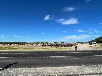 Migrants continue to stream up from the border near Normandy, Texas, on Father's Day as agents begin processing the more than 400 migrants from a single group crossing. (Randy Clark/Breitbart Texas)