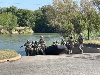 Texas National Guardsmen launch a pair of Zodiac river patrol boats in Eagle Pass. (Randy Clark/Breitbart Texas)