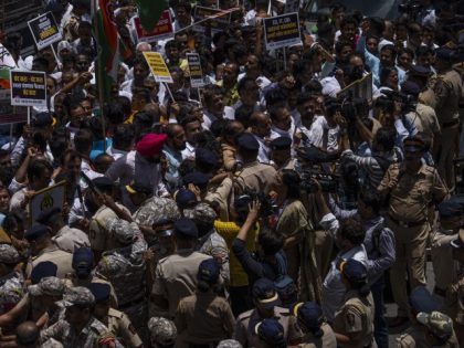 Indian police stop opposition Congress party workers from heading towards Enforcement Dire