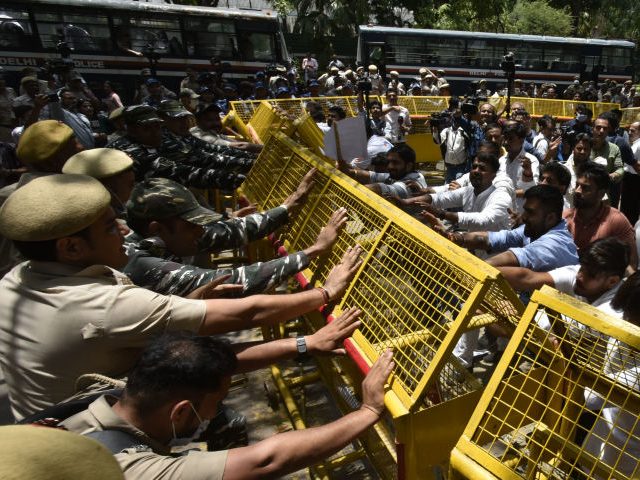NEW DELHI, INDIA - JUNE 15: Delhi Police detained Congress Workers during Congress protest march AICC to ED Office after Congress leader, Rahul Gandhi summoned to appear before the Enforcement Directorate for his alleged role in a money-laundering case linked to the National Herald newspaper outside the AICC Akbar Road …