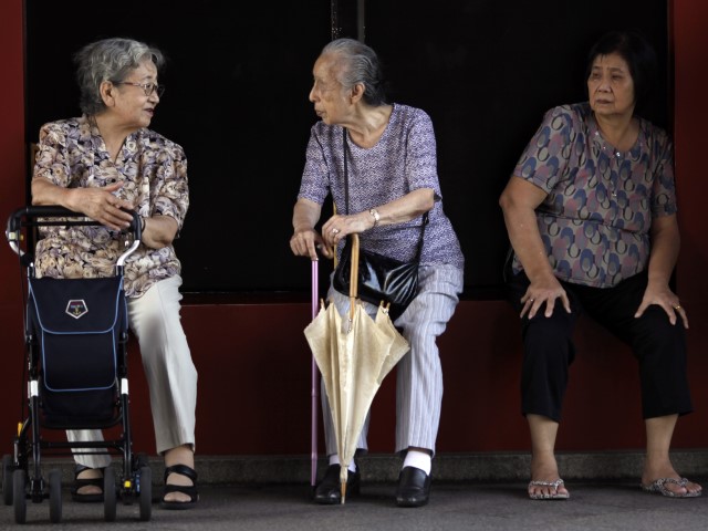 Elderly women sit and talk in Tokyo, Thursday, September 13, 2012. (Junji Kurokawa/AP)