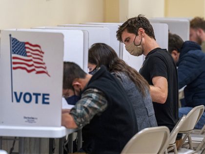 Voters cast ballots at the City Hall polling location in San Francisco, California, US, on Tuesday, June 7, 2022. California's primary is its first held under new district lines and after the states loss of a district in reapportionment for the first time in state history. Photographer: David Paul Morris/Bloomberg …