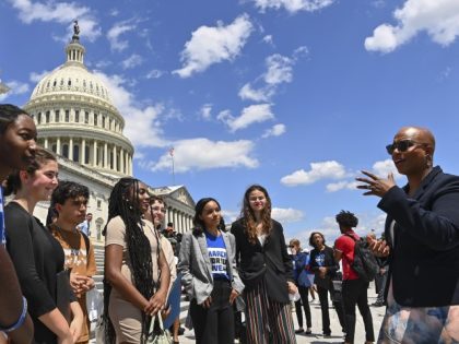 WASHINGTON, DC - JUNE 9: Zoe Touray, 18, of Oxford, Michigan, far left, and members of the March For Our Lives movement speak to Rep. Ayanna Pressley (D-MA) far right, outside the U.S. Capitol on June 9, 2022, in Washington, D.C. Zoe is a survivor of the Oxford High school …