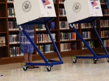 NEW YORK, NEW YORK - JUNE 28: People vote during the June Primary Election at Brooklyn Central Library on June 28, 2022 in New York, New York. Residents of NYC are voting in the primaries for governor and lieutenant governor and state assembly, and local offices. The congressional redistricting process …