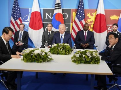 President Joe Biden, center, meets with South Korea's President Yoon Suk Yeol, left,