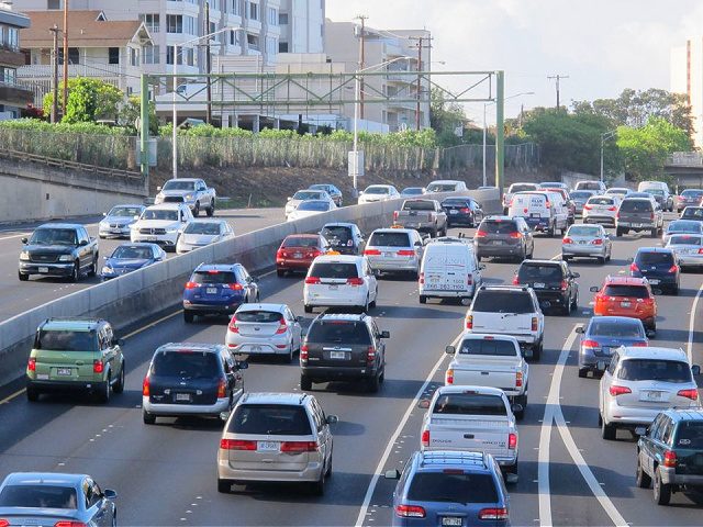 In this Friday, June 26, 2015 photo, drivers head into downtown Honolulu from the island's West side. On an island that many people think of as paradise, the struggle to get to school or to work in crushing traffic gridlock is a daily part of life. The amount of time …